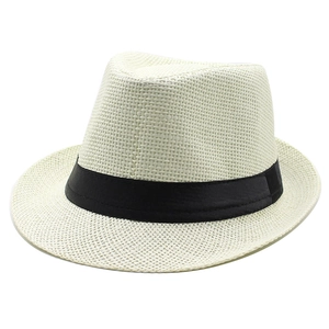 Detailed close-up of woven fedora texture with black ribbon on a summer sun hat