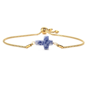 Detail of adjustable gold box chain bracelet with blue marble cross and slider clasp