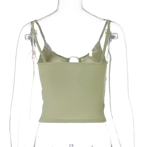 Detail view of the back of a lime green cropped tank top with elastic ribbed fabric texture