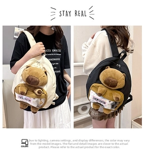 Detail of cute Capybara plush backpacks in black and white with 3D stuffed animal design