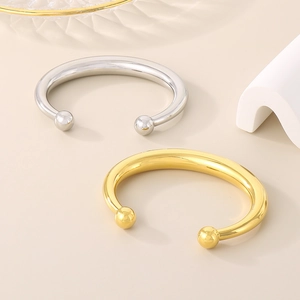 Minimalist 18k gold and silver hollow C-shaped open bangles with polished sphere ends
