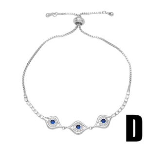Adjustable silver Evil Eye bracelet with blue crystals and sparkling white zircons