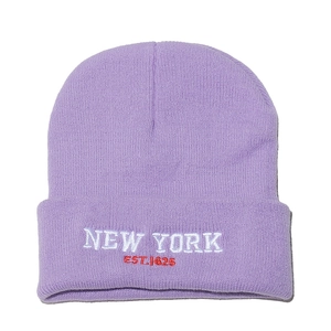 Detailed embroidery of New York text on a purple ribbed knit beanie hat fold