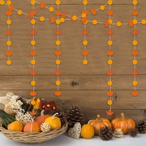 Fall maple leaf and pumpkin hanging garland for Thanksgiving party decoration on wood backdrop