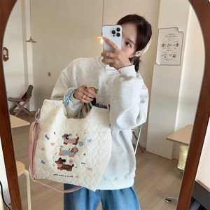 Quilted heart tote bag with cute cartoon dog embroidery and dual colorful straps