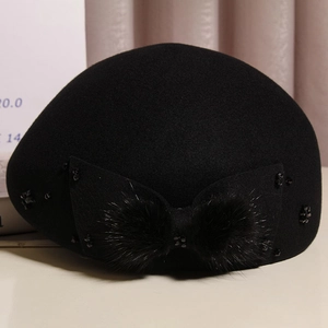 Elegant wool beret hat for women with a large mink fur bow and delicate bead details