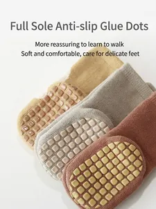 Thick non-slip baby walking socks with full grip sole in yellow grey and red colors