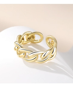 Close-up of golden adjustable open ring with twisted chain texture on white base