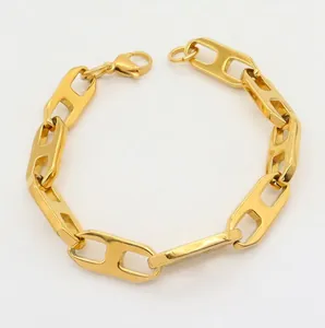 Detailed view of gold stainless steel U-shaped chain bracelet with lobster clasp closure