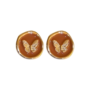 Boucles d'oreilles papillon géométriques café avec cercles métalliques dorés vintage
