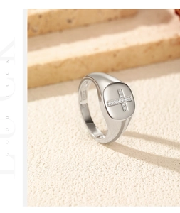 Macro shot of S925 sterling silver signet ring with micro-pave cross design and hallmark