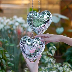 Silver heart-shaped disco ball mirror ornament with chain for festive party decoration