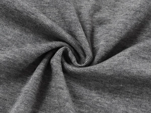Detailed macro view of gray tencel wool fabric texture with soft knit ripples