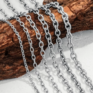 Silver stainless steel chain set showing six different sizes of O-link chains on wood