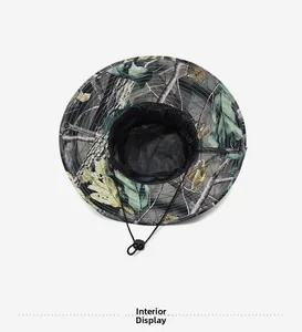 Detail view of leafy camouflage sun hat showing breathable black mesh lining and chin strap