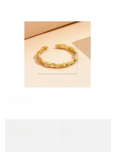 Detailed view of 18k gold plated braided stainless steel ring with 17mm adjustable size