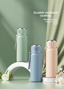 Detailed view of matte finish insulated water bottles in three Morandi pastel colors