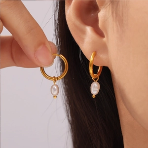 Elegant gold hoop earrings with freshwater pearl drops and minimalist titanium steel plating