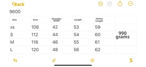 Detailed size chart for oversized knitted jacket showing measurements for XS to L sizes