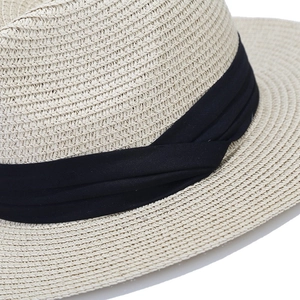 Classic Panama straw hat in beige with black band detail for sun protection