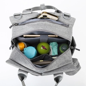 Spacious grey diaper backpack with compartments for bottles, tablet, and baby essentials