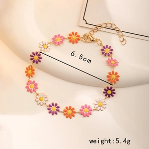 Detailed view of daisy enamel bracelet with 6.5cm diameter and 5.4g weight specs