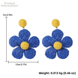 Detail showing dimensions and weight of blue raffia flower earrings with yellow center