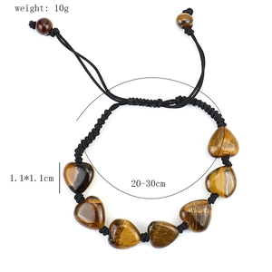 Detailed view of handmade tiger eye heart bracelet with 1.1cm bead size and 20-30cm adjustable cord