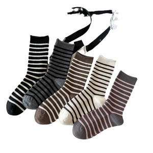Five pairs of retro striped crew socks in assorted neutral colors and knit texture