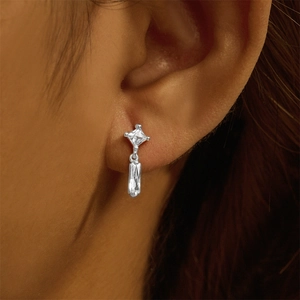 Close-up of S925 silver thread piercing earring featuring clear square opal and crystal drops