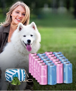 Detail of pink and blue biodegradable dog poop bags with a zebra pattern dispenser pouch