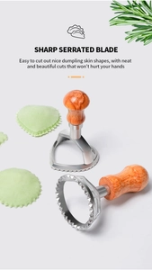 Sharp serrated stainless steel heart and round dumpling cutters with ergonomic wood handles