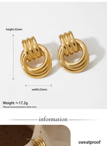 Detail showing 32mm vintage golden door-knocker earrings with sweatproof dimensions and weight
