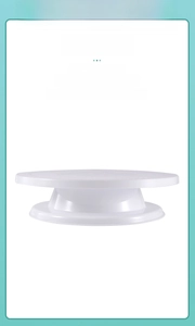 Detail of white 360-degree rotating cake turntable made from food-grade PP plastic