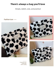Close-up of cow print plush coin purse with zipper and Time to Party woven label