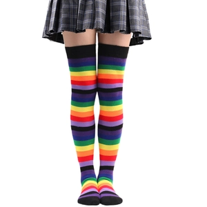 Close-up of rainbow striped over-the-knee socks showing vibrant colors and cotton fabric