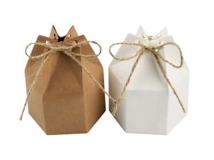 Hexagonal kraft paper gift boxes in brown and white with decorative hemp rope details