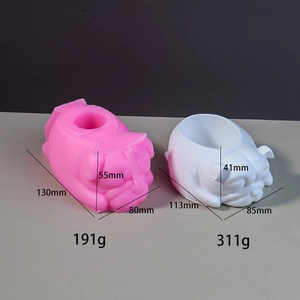 Detailed comparison of dog-shaped silicone mold and finished plaster craft showing dimensions