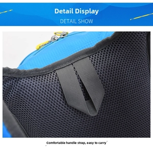 Detail of blue ripstop fabric and grey breathable mesh on hiking backpack
