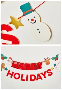 Detail of Christmas banner featuring Happy Holidays lettering with snowman and reindeer icons