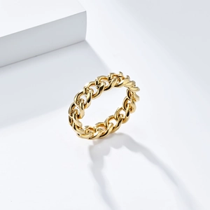 Macro side view of a gold cuban link chain ring made of durable titanium steel