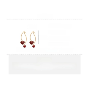 Size chart showing long red heart earrings dimensions 6.7cm by 1.8cm in resin and alloy