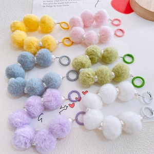 Colorful plush ball phone charms with pearls in yellow, pink, blue, green, and white