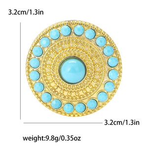 Dettaglio della spilla in turchese con dimensioni di 3,2cm e peso di 9,8g