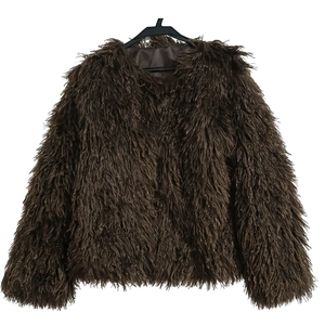 Brown faux fur jacket with fluffy long hair texture and round neck on a hanger