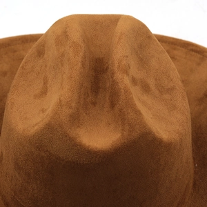 Western style brown suede cowboy hat with rolled brim and soft textured felt finish