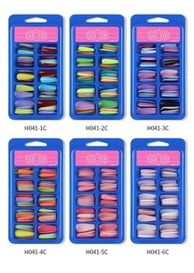 Six sets of 100pcs ballet nail tips in blue boxes with solid and gradient colors