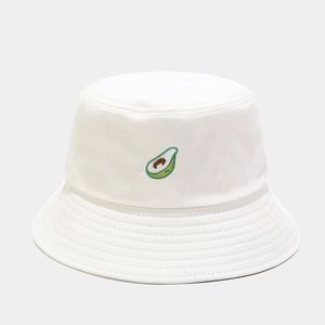 Close-up of cute avocado embroidery on white cotton bucket hat with detailed stitching
