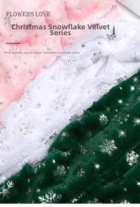 Detail of thickened plush Christmas fabric with silver snowflake patterns in multiple colors