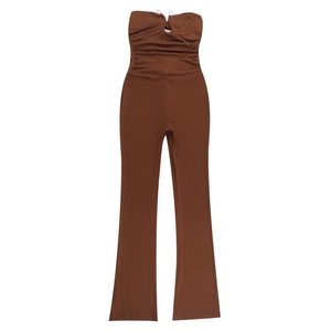Close-up of brown strapless jumpsuit featuring ruched bust detail and flared wide leg cut